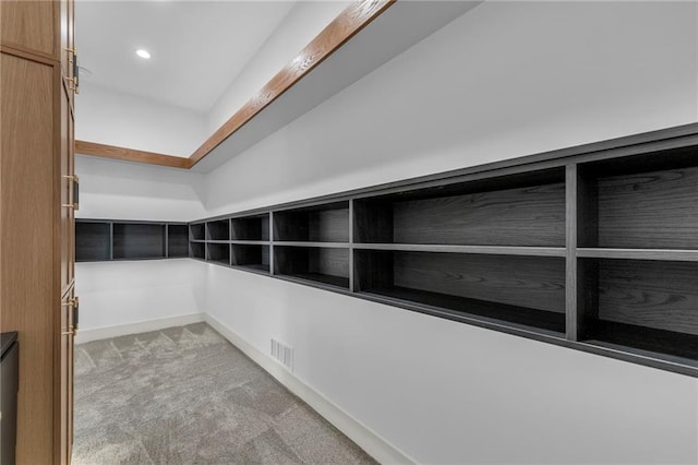 interior details featuring visible vents, recessed lighting, carpet flooring, and baseboards