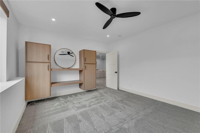 unfurnished bedroom with recessed lighting, a ceiling fan, carpet, and baseboards