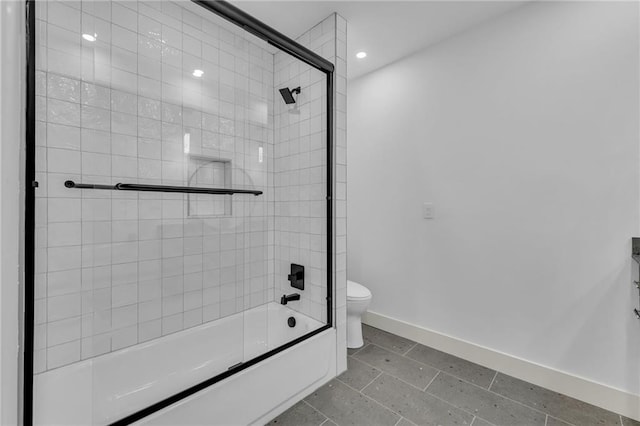 full bathroom with recessed lighting, tile patterned floors, toilet, baseboards, and bath / shower combo with glass door