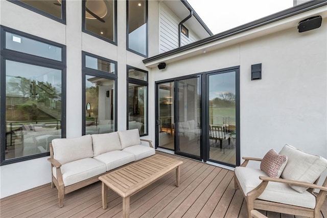 deck with an outdoor hangout area