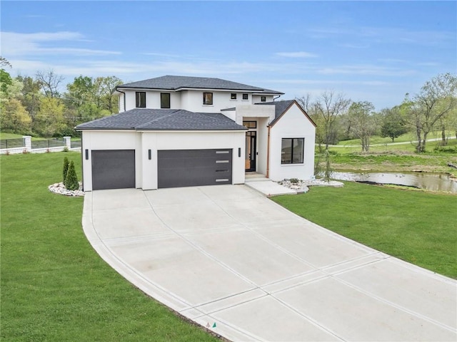 view of front of property with stucco siding, a shingled roof, a garage, driveway, and a front lawn
