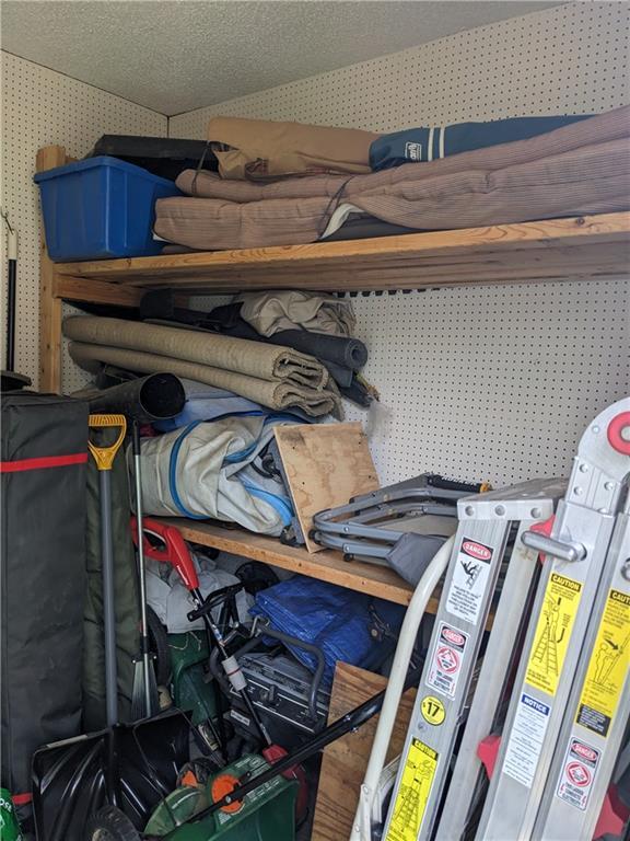 4012 NE Brooktree Ln, Kansas City, MO 64119 - storage area featuring water heater