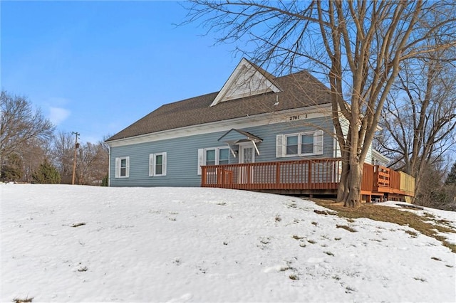 2701 Wilson Ave, Leavenworth, KS 66048 - snow covered property featuring a wooden deck
