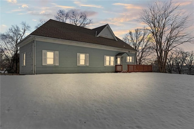 2701 Wilson Ave, Leavenworth, KS 66048 - property exterior at dusk featuring a wooden deck