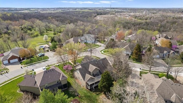 9708 Walnut Woods Dr, Kansas City, MO 64139 - aerial view with a residential view