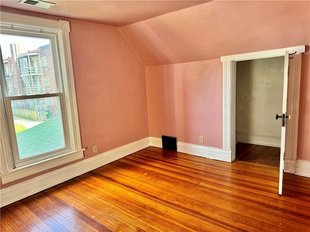 3640 Forest Ave, Kansas City, MO 64109 - additional living space featuring wood-type flooring, lofted ceiling, and baseboards