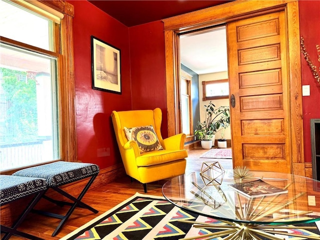 3640 Forest Ave, Kansas City, MO 64109 - living area featuring wood finished floors and baseboards