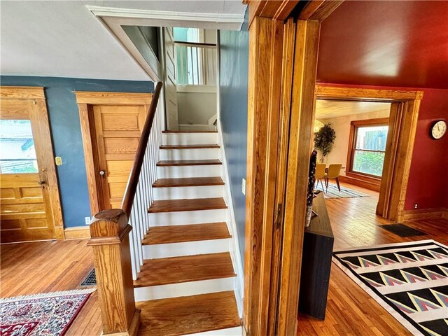 3640 Forest Ave, Kansas City, MO 64109 - stairs featuring wood finished floors and baseboards