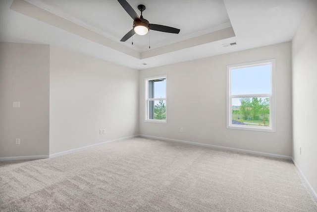 16470 W 166th Pl, Olathe, KS 66062 - unfurnished room featuring a raised ceiling, carpet floors, baseboards, a ceiling fan, and ornamental molding