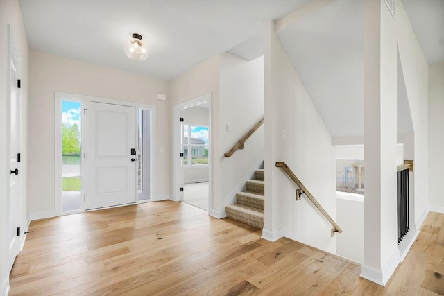 16470 W 166th Pl, Olathe, KS 66062 - foyer entrance featuring light wood-style floors and baseboards