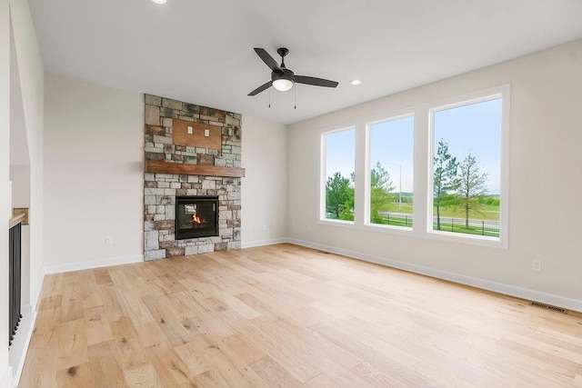 16470 W 166th Pl, Olathe, KS 66062 - unfurnished living room with a fireplace, wood finished floors, a ceiling fan, baseboards, and recessed lighting