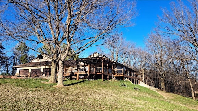 2101A Dove Rd, Longton, KS 67352 - back of house featuring a lawn and a wooden deck