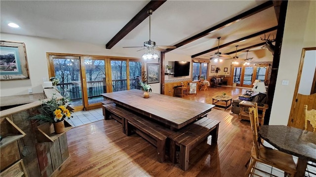 2101A Dove Rd, Longton, KS 67352 - dining area featuring french doors, a ceiling fan, vaulted ceiling with beams, and wood finished floors