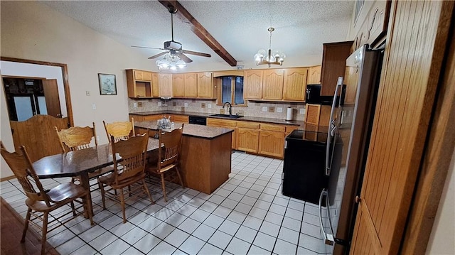 2101A Dove Rd, Longton, KS 67352 - kitchen featuring a textured ceiling, backsplash, light tile patterned flooring, a sink, and freestanding refrigerator