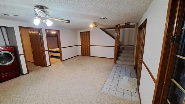 2101A Dove Rd, Longton, KS 67352 - interior space with carpet floors, a textured ceiling, washer / clothes dryer, laundry area, and visible vents