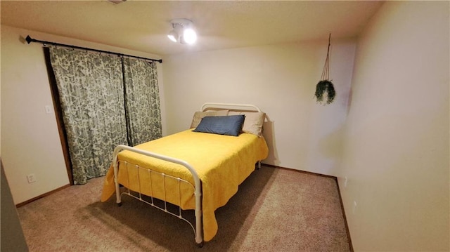 2101A Dove Rd, Longton, KS 67352 - carpeted bedroom with baseboards