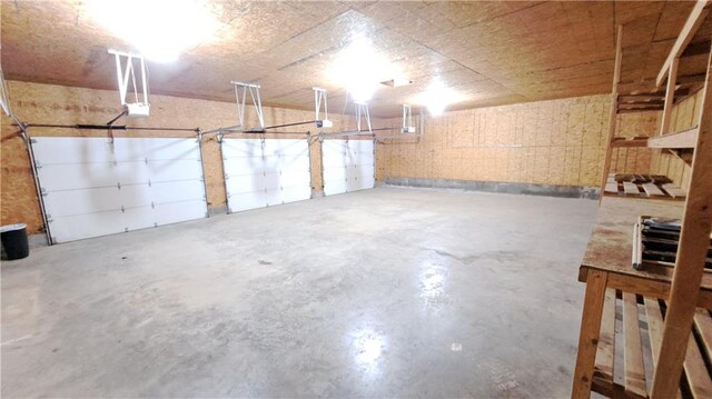 2101A Dove Rd, Longton, KS 67352 - garage featuring a garage door opener