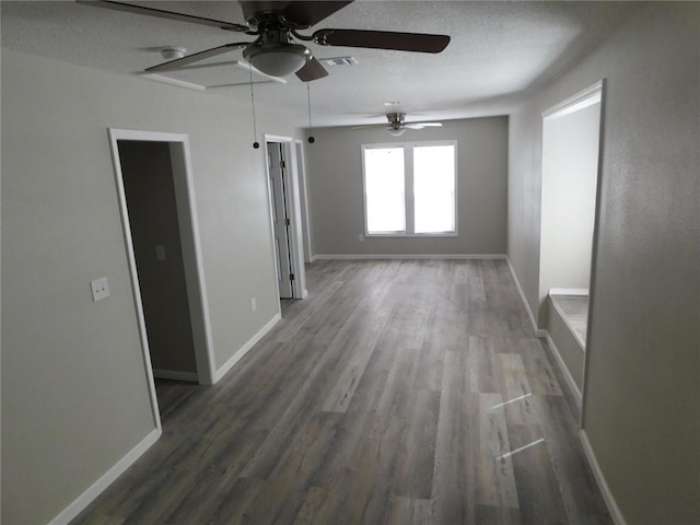 308 W 5th St, Pittsburg, KS 66762 - spare room featuring a ceiling fan, visible vents, baseboards, and wood finished floors