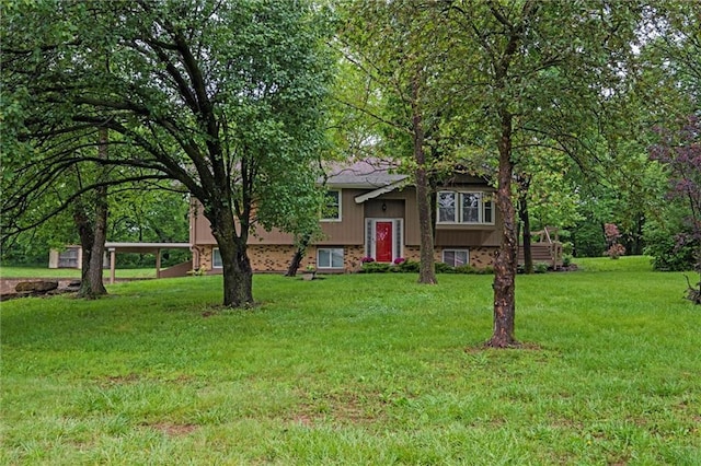 14404 Kansas Ave, Bonner Springs, KS 66012 - bi-level home with a front yard