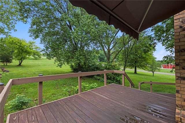 14404 Kansas Ave, Bonner Springs, KS 66012 - wooden terrace featuring a lawn