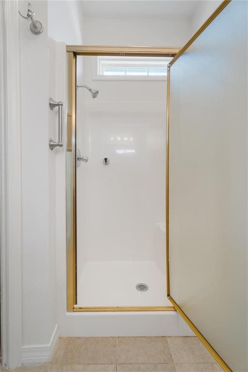full bathroom featuring a shower stall