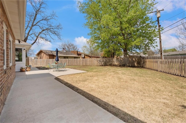 view of yard featuring a fenced backyard and a patio area