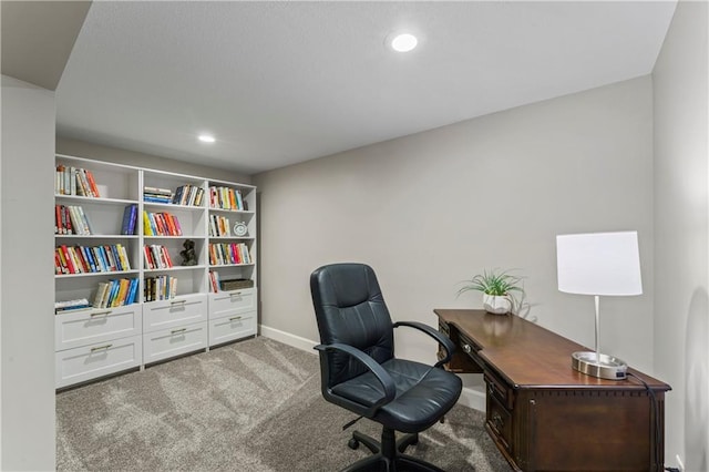 carpeted office space featuring recessed lighting and baseboards