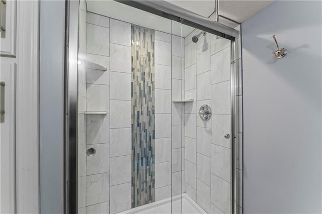 full bath featuring a stall shower