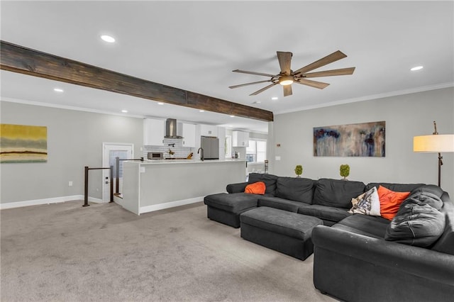 living area with recessed lighting, light colored carpet, a ceiling fan, ornamental molding, and baseboards