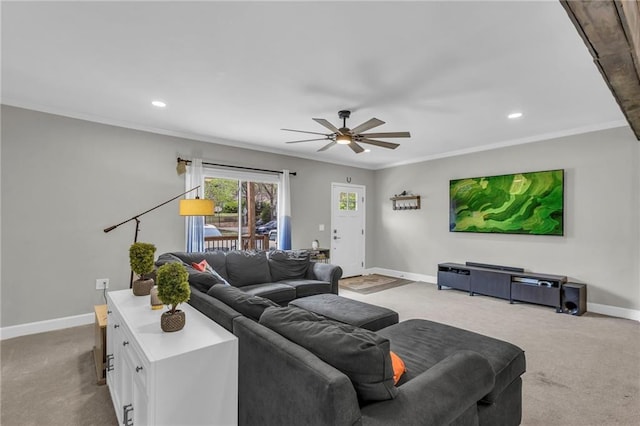 living area with carpet, baseboards, ceiling fan, recessed lighting, and crown molding