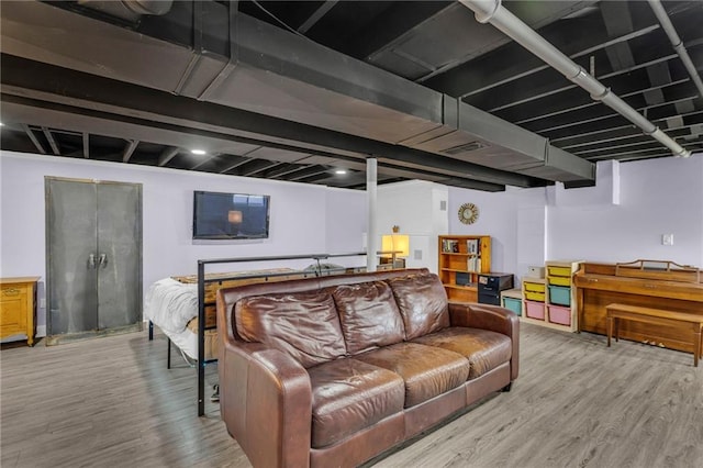 bedroom with wood finished floors