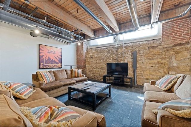 308 W 8th St Unit 505, Kansas City, MO 64105 - living area featuring carpet floors, a healthy amount of sunlight, and beamed ceiling