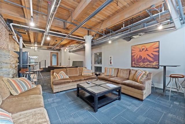 308 W 8th St Unit 505, Kansas City, MO 64105 - living room featuring baseboards and carpet