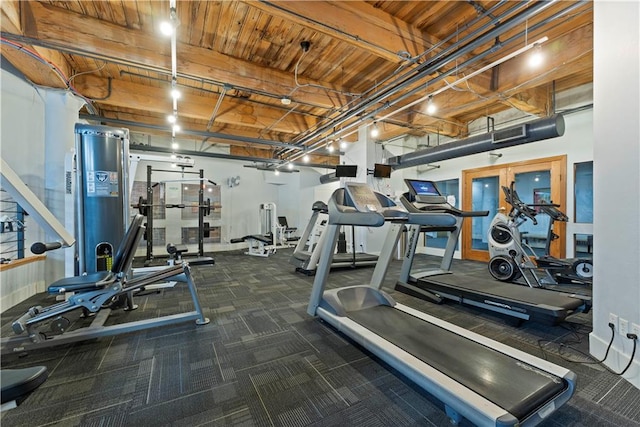 308 W 8th St Unit 505, Kansas City, MO 64105 - gym with baseboards, carpet flooring, and wooden ceiling