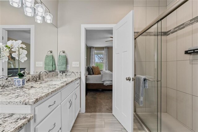 200 NW 180th St, Smithville, MO 64089 - full bathroom with connected bathroom, a stall shower, and vanity