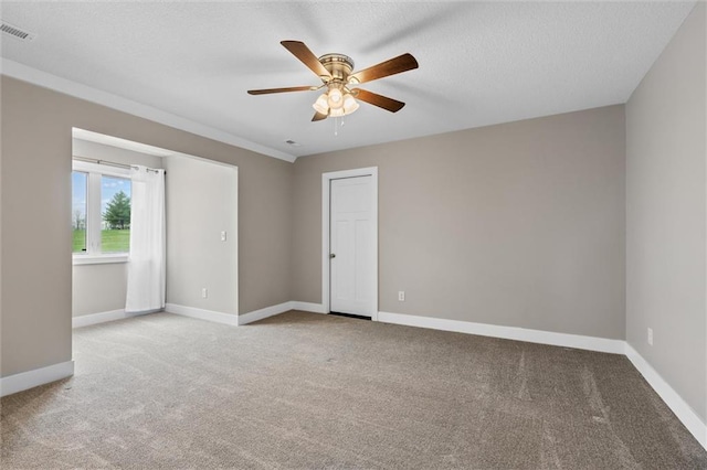 200 NW 180th St, Smithville, MO 64089 - spare room with carpet floors, a ceiling fan, and baseboards