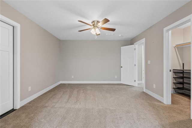200 NW 180th St, Smithville, MO 64089 - unfurnished bedroom with carpet floors, baseboards, a closet, and a ceiling fan