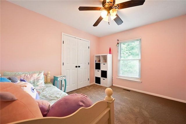 1216 SE Meridian Dr, Lees Summit, MO 64081 - carpeted bedroom featuring baseboards, a closet, and ceiling fan