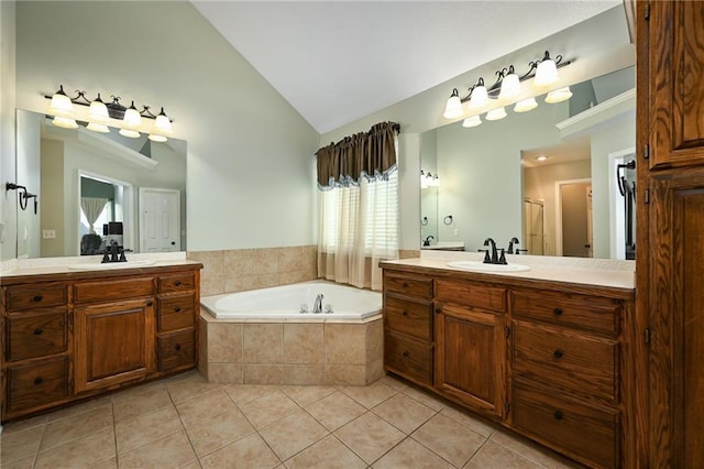 1216 SE Meridian Dr, Lees Summit, MO 64081 - full bath with tile patterned floors, a garden tub, two vanities, high vaulted ceiling, and a shower