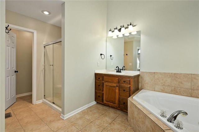 1216 SE Meridian Dr, Lees Summit, MO 64081 - bathroom with a garden tub, tile patterned flooring, vanity, and a shower stall