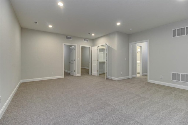 unfurnished bedroom with visible vents and recessed lighting