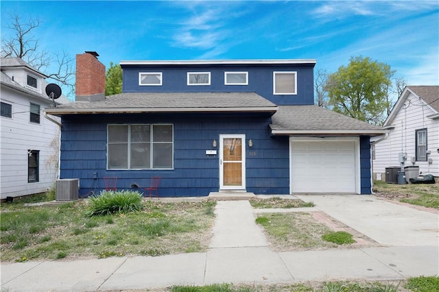 bungalow featuring roof with shingles, cooling unit, and concrete driveway