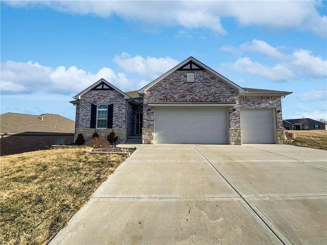 view of front of property with driveway, brick siding, and a garage