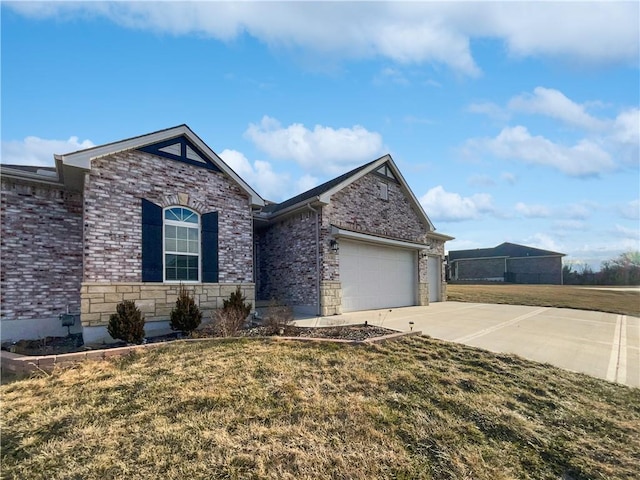 ranch-style house featuring a front lawn, driveway, stone siding, and a garage