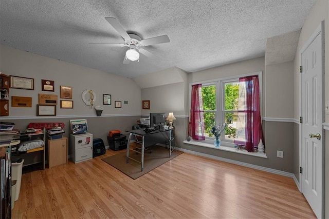 9111 Allman Rd, Lenexa, KS 66219 - office with a ceiling fan, wood finished floors, and a textured ceiling