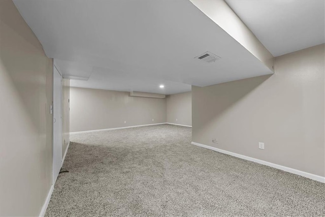 9111 Allman Rd, Lenexa, KS 66219 - finished below grade area featuring carpet flooring and recessed lighting