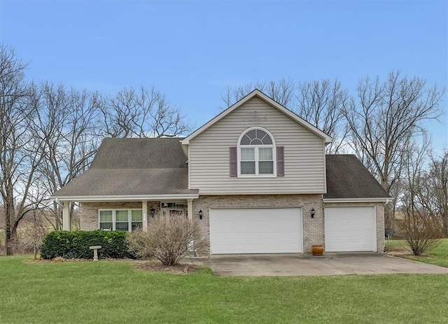 view of front of house with a front lawn, roof with shingles, brick siding, an attached garage, and driveway