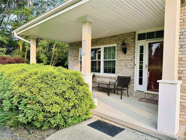 13210 SE 43rd Service Rd, Faucett, MO 64448 - view of covered porch