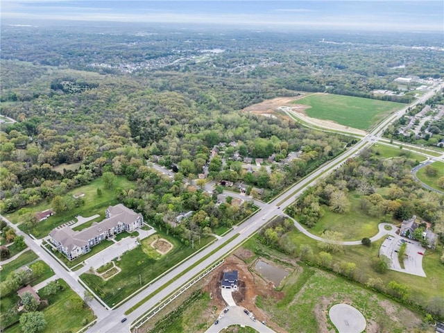 aerial view featuring a view of trees