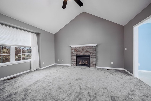 953 N Hickory Dr, Tonganoxie, KS 66086 - unfurnished living room featuring a ceiling fan, lofted ceiling, carpet, a fireplace with flush hearth, and baseboards